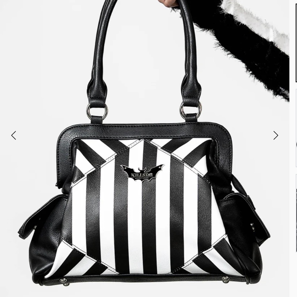 NEVER TRUST THE LIVING HANDBAG 💀